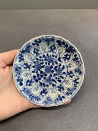 Twelve Chinese blue and white saucers and eight cups, Kangxi/Yongzheng