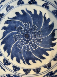 A Chinese powder blue-ground biscuit, blue and white 'Buddhist lion' bowl, Xuande mark, Kangxi