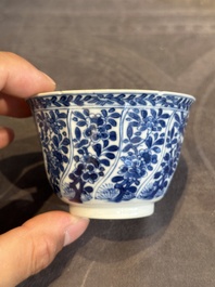 Five Chinese blue and white cups and saucers with floral design, Yu 玉 mark, Kangxi