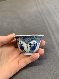 Twelve Chinese blue and white saucers and eight cups, Kangxi/Yongzheng