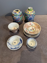 Seven Chinese blue, white and famille rose cups, six saucers and two English-decorated jarlets, Kangxi/Yongzheng