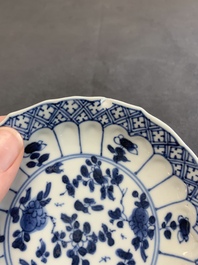 Twelve Chinese blue and white saucers and eight cups, Kangxi/Yongzheng