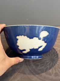 A Chinese powder blue-ground biscuit, blue and white 'Buddhist lion' bowl, Xuande mark, Kangxi