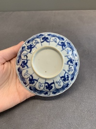 Twelve Chinese blue and white saucers and eight cups, Kangxi/Yongzheng