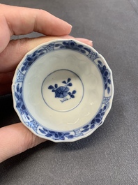 Twelve Chinese blue and white saucers and eight cups, Kangxi/Yongzheng