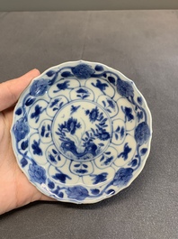 Twelve Chinese blue and white saucers and eight cups, Kangxi/Yongzheng