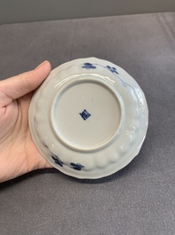 Twelve Chinese blue and white saucers and eight cups, Kangxi/Yongzheng
