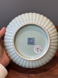 A Chinese celadon-glazed chrysanthemum-shaped plate, Qianlong mark, 20th C.
