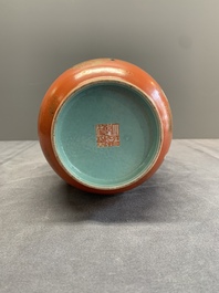 A Chinese famille rose coral-red-ground 'immortals' rouleau vase, Qianlong mark, Republic