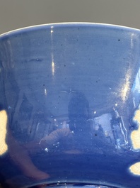 A Chinese powder blue-ground biscuit, blue and white 'Buddhist lion' bowl, Xuande mark, Kangxi