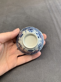 Twelve Chinese blue and white saucers and eight cups, Kangxi/Yongzheng
