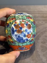 Seven Chinese blue, white and famille rose cups, six saucers and two English-decorated jarlets, Kangxi/Yongzheng