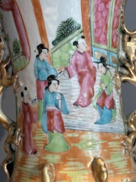 A pair of Chinese Canton famille rose vases with narrative design, 19th C.