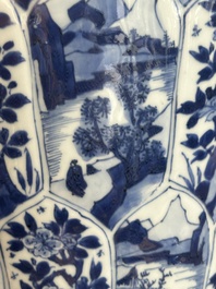 A Chinese blue and white vase and cover with landscapes and flowers, Kangxi