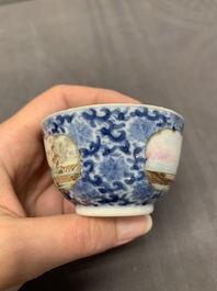A Chinese export famille rose cup and saucer with a herring merchant, Qianlong