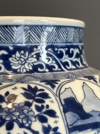 A Chinese blue and white vase and cover with landscapes and flowers, Kangxi