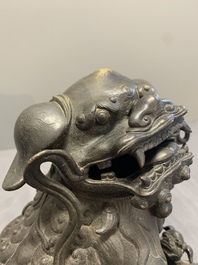 A pair of fine Chinese bronze Buddhist lions, 17/18th C.