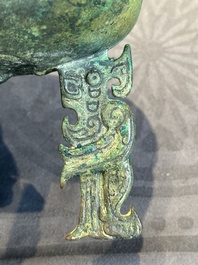 A rare Chinese archaic bronze tripod ritual food vessel, 'ding 鼎', Shang