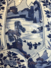 A Chinese blue and white vase and cover with landscapes and flowers, Kangxi