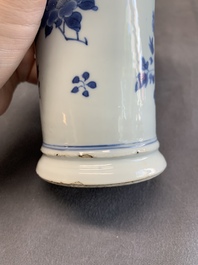A pair of Chinese blue and white beaker vases with floral sprigs, Transitional period