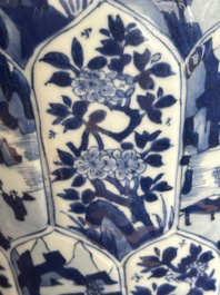 A Chinese blue and white vase and cover with landscapes and flowers, Kangxi