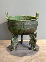 A rare Chinese archaic bronze tripod ritual food vessel, 'ding 鼎', Shang