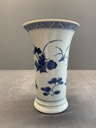 A pair of Chinese blue and white beaker vases with floral sprigs, Transitional period