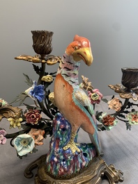 A pair of candle holders mounted with Chinese famille rose models of pheasants, Qianlong