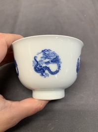 A Chinese blue and white 'dragon' cup, Kangxi mark, 19/20th C.