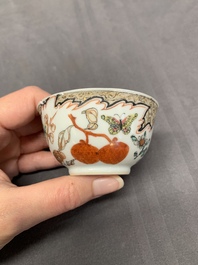 Three Chinese famille rose 'flowers and butterflies' cups and saucers, Yongzheng