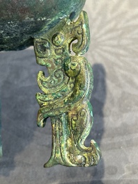 A rare Chinese archaic bronze tripod ritual food vessel, 'ding 鼎', Shang
