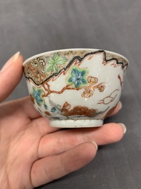 Three Chinese famille rose 'flowers and butterflies' cups and saucers, Yongzheng