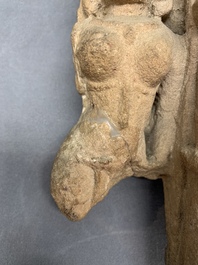 An Indian architectural red sandstone fragment with divinities, 13th C.