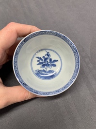 Five Chinese caf&eacute;-au-lait-ground blue and white cups and four saucers, conical shell mark, Kangxi