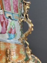 A pair of Chinese Canton famille rose vases with narrative design, 19th C.