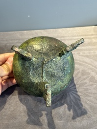 A rare Chinese archaic bronze tripod ritual food vessel, 'ding 鼎', Shang
