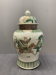 A pair of famille verte-style 'warriors on horseback' vases and covers, Samson, Paris, 19th C.