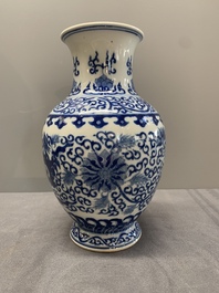 A Chinese blue and white 'phoenix and flower scroll' vase, Qianlong mark, 19th C.