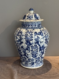 A Chinese blue and white vase and cover with landscapes and flowers, Kangxi