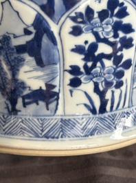 A Chinese blue and white vase and cover with landscapes and flowers, Kangxi