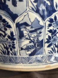 A Chinese blue and white vase and cover with landscapes and flowers, Kangxi
