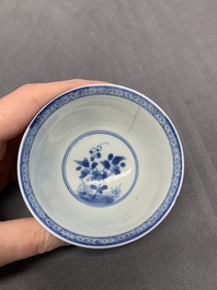 Five Chinese caf&eacute;-au-lait-ground blue and white cups and four saucers, conical shell mark, Kangxi