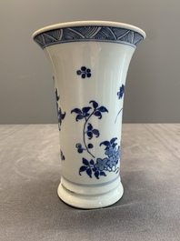 A pair of Chinese blue and white beaker vases with floral sprigs, Transitional period