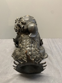 A pair of fine Chinese bronze Buddhist lions, 17/18th C.