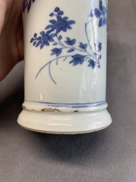 A pair of Chinese blue and white beaker vases with floral sprigs, Transitional period