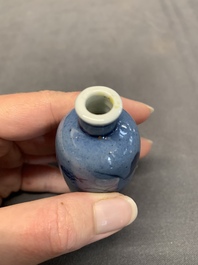 Three Chinese powder blue-ground blue and white snuff bottles and one blue and white snuff bottle, 19th C.