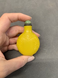 A Chinese yellow Peking glass 'elephant' snuff bottle, Xing You Heng Tang 行有恆堂 mark, 19th C.