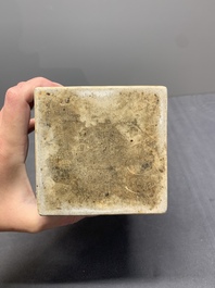 A Chinese blue and white square bottle with figural design, Kangxi