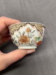 Three Chinese famille rose 'flowers and butterflies' cups and saucers, Yongzheng