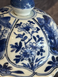 A Chinese blue and white vase and cover with landscapes and flowers, Kangxi